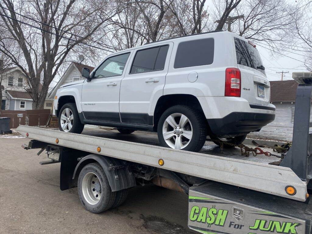 sell your car for top cash to hook and book towing and get free towing